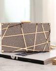 Sleek and Sophisticated Evening Clutch. It is a classic and elegant accessory designed for formal events, combining style and functionality. The clutch features a sleek and sophisticated design in black, making it the perfect complement to your special evening ensemble.