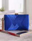 an elegant silk clutch, featuring a smooth texture and timeless design, ideal for enhancing your formal attire