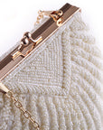 a Handcrafted Bead Embroidery Evening Bag with a Shell-Inspired Design, a stunning and unique accessory perfect for formal events and special occasions.