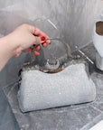 a Rhinestone-Embellished Handbag, a glamorous and stylish accessory perfect for evening events and special occasions.