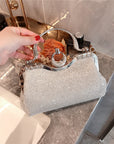 a Rhinestone-Embellished Handbag, a glamorous and stylish accessory perfect for evening events and special occasions.