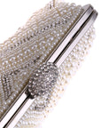 a Pearl Clutch, a classic and elegant accessory perfect for formal occasions and special events