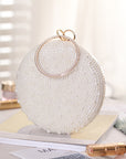 a Pearl and Diamond Evening Bag: Timeless Elegance in Hand, a sophisticated and luxurious accessory perfect for formal events and special occasions