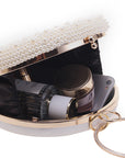 a Pearl and Diamond Evening Bag: Timeless Elegance in Hand, a sophisticated and luxurious accessory perfect for formal events and special occasions