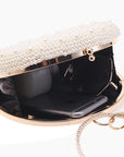 a Pearl and Diamond Evening Bag: Timeless Elegance in Hand, a sophisticated and luxurious accessory perfect for formal events and special occasions