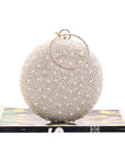 a Pearl and Diamond Evening Bag: Timeless Elegance in Hand, a sophisticated and luxurious accessory perfect for formal events and special occasions