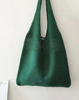 a Crochet Tote Bag, a chic and handcrafted accessory perfect for various occasions, from casual outings to beach trips.