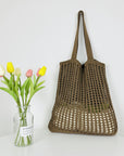 a Crochet Tote Bag, a sustainable and stylish accessory perfect for eco-conscious fashion enthusiasts.