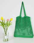 a Crochet Tote Bag, a sustainable and stylish accessory perfect for eco-conscious fashion enthusiasts.