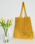 a Crochet Tote Bag, a sustainable and stylish accessory perfect for eco-conscious fashion enthusiasts.