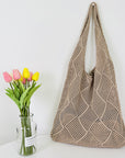 Elegant Crochet Shoulder Bag in Natural Fibers, a chic accessory for ethical fashion enthusiasts.Elegant Crochet Shoulder Bag in Natural Fibers, a chic accessory for ethical fashion enthusiasts.