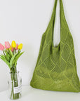 Elegant Crochet Shoulder Bag in Natural Fibers, a chic accessory for ethical fashion enthusiasts.