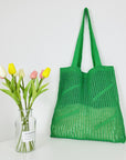 Handmade Crochet Tote Bag in Earthy Tones, a sustainable fashion choice.