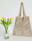 Handmade Crochet Tote Bag in Earthy Tones, a sustainable fashion choice.