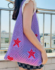 Crochet Shoulder Bag in Vibrant Colors, adding flair to your ensemble.