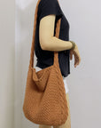 a Crochet Crossbody Bag, a stylish and eco-friendly accessory with intricate craftsmanship