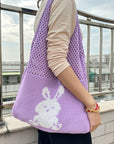Crochet Shoulder Bag in Vibrant Colors, adding flair to your ensemble.