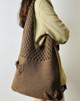 Elegant Crochet Shoulder Bag in Natural Fibers, an ethical choice for sustainable style.