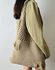 Elegant Crochet Shoulder Bag in Natural Fibers, an ethical choice for sustainable style.