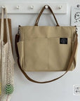 Modern Canvas Satchel with Top Handle and Shoulder Strap