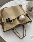Modern Canvas Satchel with Top Handle and Shoulder Strap