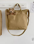 Trendy Canvas Handbag with Top Handle and Convertible Shoulder Strap