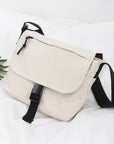 Travel in Style with Our Spacious and Lightweight Canvas Crossbody Bag