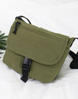 Travel in Style with Our Spacious and Lightweight Canvas Crossbody Bag