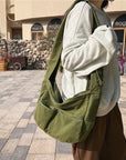 Stylish and Durable Canvas Crossbody Bag with Multiple Pockets