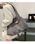 Stay Organized and Fashionable with Our Multi-Compartment Canvas Shoulder Bag