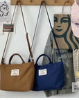 Take on the Day with Our Adjustable Strap Canvas Bag