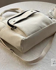 Classic Canvas Messenger Bag with Adjustable Strap: Perfect for Work or Play