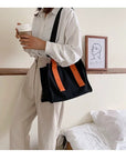 Versatile Canvas Tote with Top Handle and Adjustable Strap