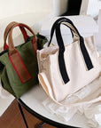 Versatile Canvas Tote with Top Handle and Adjustable Strap
