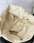 Get Ready to Conquer Your Day with Our Stylish and Spacious Canvas Crossbody Bag