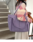 Stylish and Practical Canvas Handbag with Multiple Compartments