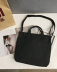 Durable Canvas Shoulder Bag with Adjustable Strap for All Occasions