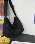 Get Ready for Work or School with Our Practical and Roomy Canvas Crossbody Bag