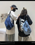 The Ultimate Hands-Free Accessory: Our Denim Crossbody Bag