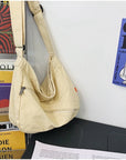 Get Ready for Work or School with Our Practical and Roomy Canvas Crossbody Bag