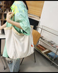 Experience the Perfect Combination of Comfort and Style with Our Canvas Shoulder Bag