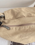 Stay Secure and Organized with Our Lockable and Detachable Canvas Crossbody Bag Pockets