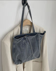 Carry Your World with Our Waxed Canvas Tote