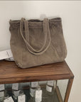 Carry Your World with Our Waxed Canvas Tote