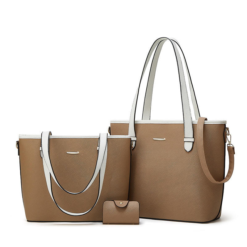 Three-piece leather bag set featuring a dual-tone design with brown, including a large tote bag, a medium shoulder bag, and a compact wallet. The set offers a sophisticated and versatile style for everyday use.