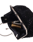 This image depicts the interior of a clutch. The inside reveals a compact yet organized space with pockets and compartments for essentials such as a phone, keys, and makeup. It is a functional and stylish accessory for keeping your belongings neatly arranged during a night out or formal event.