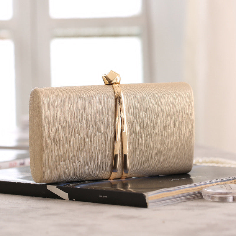 chic handheld clutches. These versatile bags are suitable for evening events and can be worn as crossbody options, offering both style and convenience."