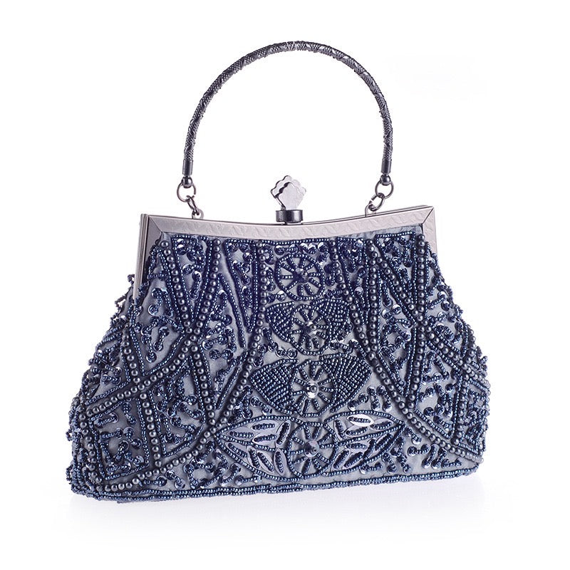 An image of the Vintage Bead Embroidery Evening Bag, a classic and sophisticated accessory adorned with intricate bead embroidery. Ideal for special occasions, qipao ensembles, brides, and bridesmaids.