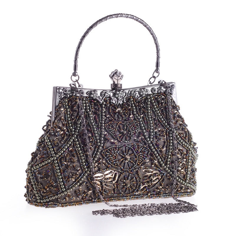 An image of the Vintage Bead Embroidery Evening Bag, a classic and sophisticated accessory adorned with intricate bead embroidery. Ideal for special occasions, qipao ensembles, brides, and bridesmaids.