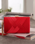 an elegant silk clutch, featuring a smooth texture and timeless design, ideal for enhancing your formal attire